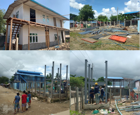 The school and water tower under construction