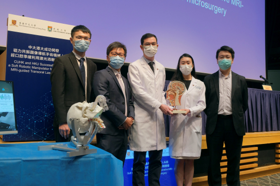 CUHK and HKU develop a soft robotic manipulator for transoral laser microsurgery on head and neck cancer guided by intra-operative magnetic resonance imaging (MRI).

(From left) Mr. Ge FANG, PhD Student and Dr. Ka Wai KWOK, Associate Professor, Department of Mechanical Engineering, Faculty of Engineering, HKU; Dr. Jason CHAN,
Associate Professor and Dr. Catherine CHAN, Honorary Clinical Tutor, Department of Otorhinolaryngology, Head and Neck Surgery, CU Medicine; and Dr. James TSOI, Associate Professor, Dental Materials Science, Faculty of Dentistry, HKU.