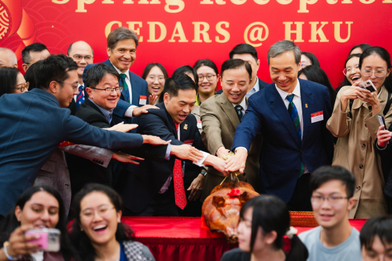 Professor Xiang Zhang, President and Vice-Chancellor; Professor Chen Lin, Vice-President and Pro-Vice-Chancellor (Business) (Interim); and Professor Kelvin Yeung, Dean of Student Affairs of HKU, officiate at the roasted pig cutting ceremony.